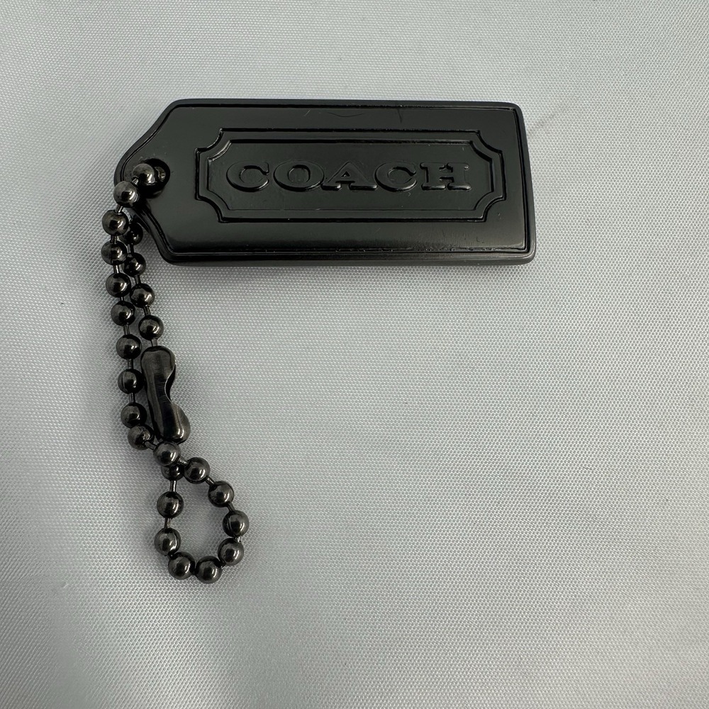 Coach Silver Stamped Metal Hangtag Bag Charm Fob 2.5 Inch By 1.25"